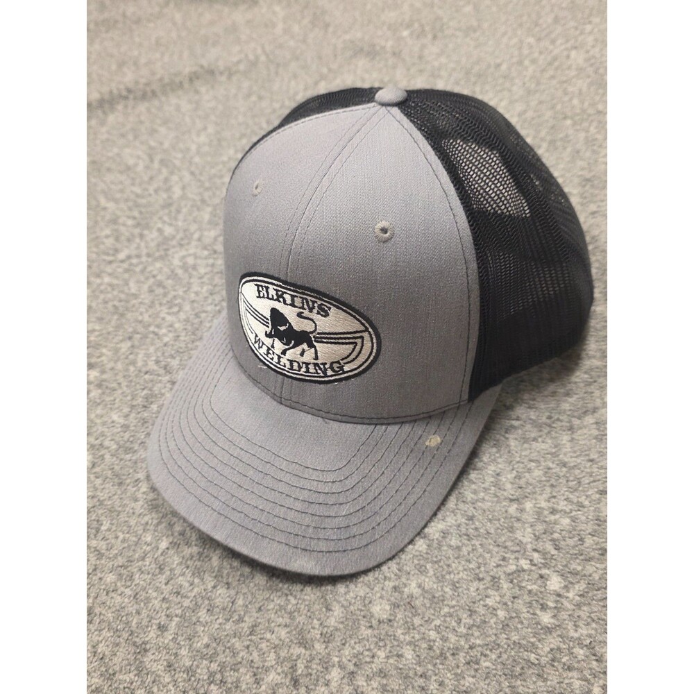 Richardson 112 Trucker Hat in a charcoal grey and black color scheme, customize